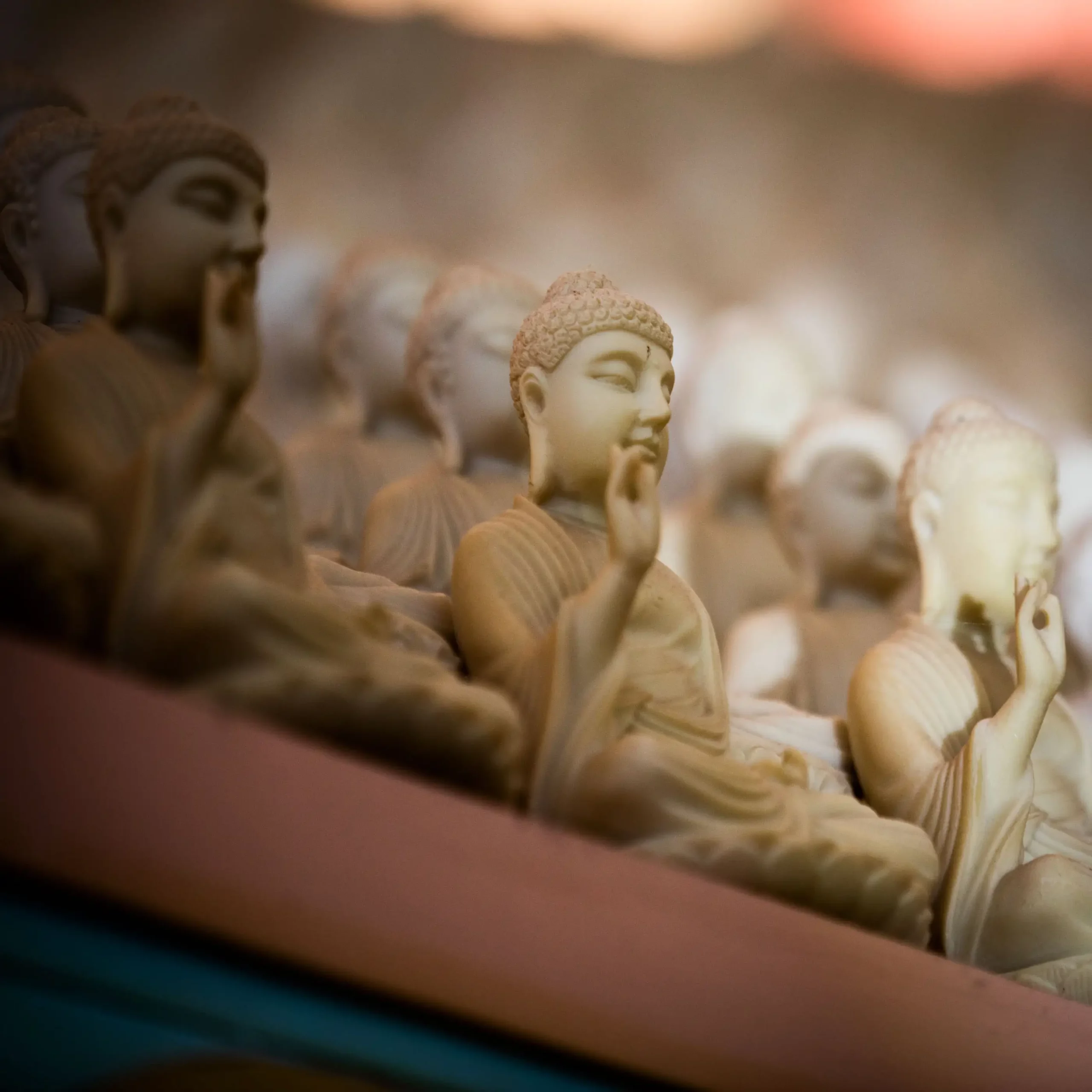 Photo of miniature Buddhas.